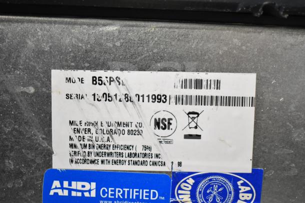 Scotsman C0630SA-32A commercial ice head on Ice-O-Matic B55PS bin label showing model, serial number, and certifications.