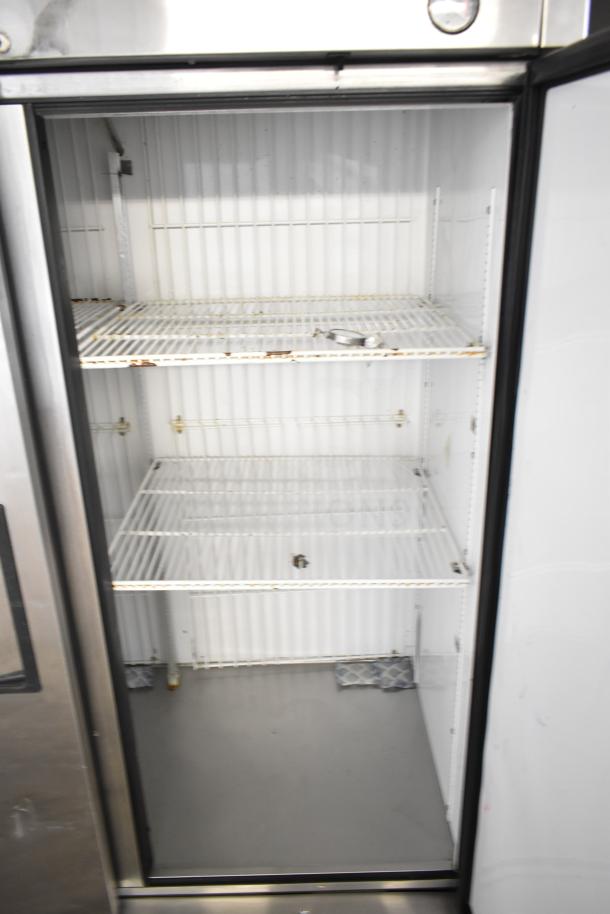 True T-49F Commercial 2 Door Reach In Freezer, 115 Volts, 1 Phase, visible interior shelves, used condition.