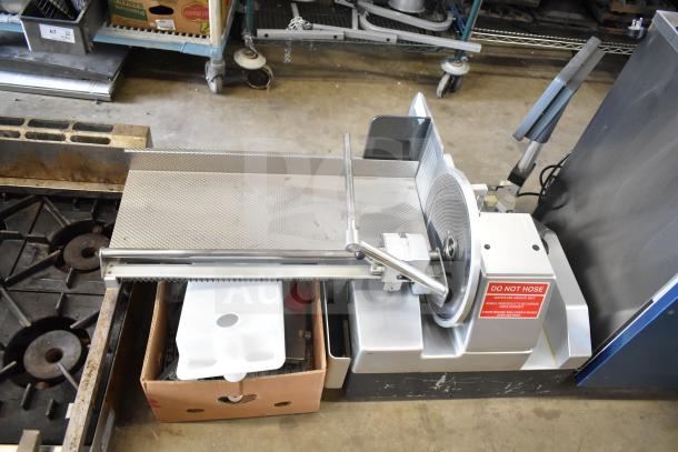 Bizerba A 404 US meat slicer stacker, 115V, 1 phase, countertop model in used condition, "Do Not Hose" label visible.