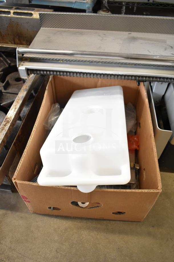 Bizerba A 404 US meat slicer stacker in a box, 115 volts, 1 phase, commercial use, good condition.