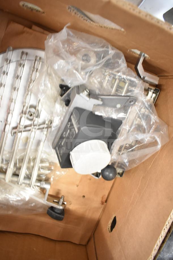 Bizerba A 404 US commercial meat slicer stacker in a box, with control knob and components, 115V, 1 phase.