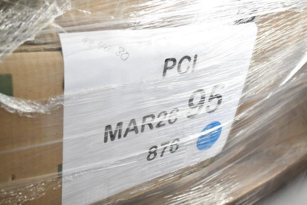 Plastic-wrapped pallet labeled "PGI MAR26-95," containing 39 scratch and dent items like plastic forks and paper plates.