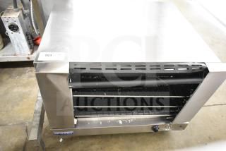 Moffat E27M3 commercial convection oven, electric, 208V, countertop model. Note: visible broken glass.