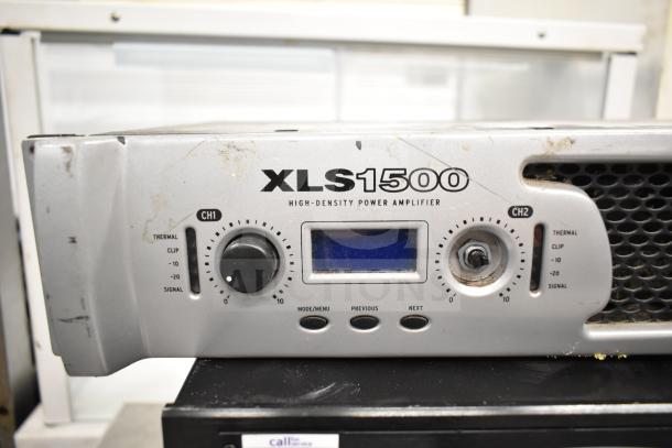Crown XLS 1500 Power Amplifier, silver, high-density, dual channel, minor scuffs, visible control knobs and display.