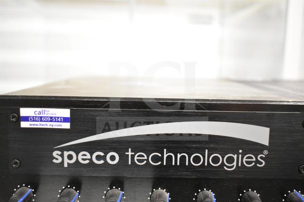 Speco Technologies PBM120A Amplifier, black, visible control knobs, service sticker with contact info, good condition.