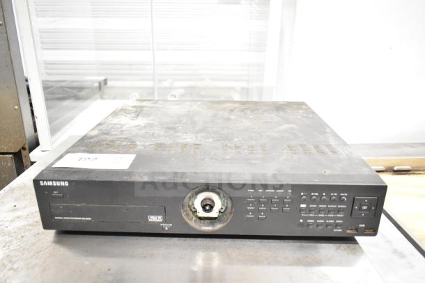 Samsung SRD-852DN Digital Video Recorder, used, dusty, missing parts, front panel controls visible, label with item number.