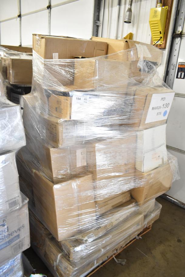 Large pallet of 29 brand new scratch and dent items including server vests, shelf, terry cloths, fryer screen, wrapped in plastic.