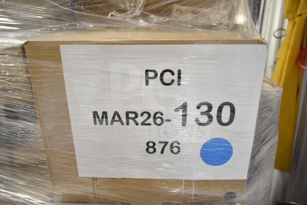 Cardboard box wrapped in plastic with label "PCI MAR26-130 876." Contains assorted new scratch and dent items.