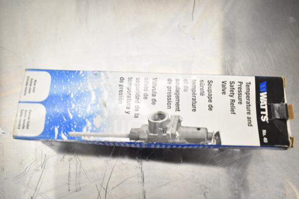 Watts Temperature and Pressure Safety Relief Valve in worn box, model No. 40, multilingual label visible.