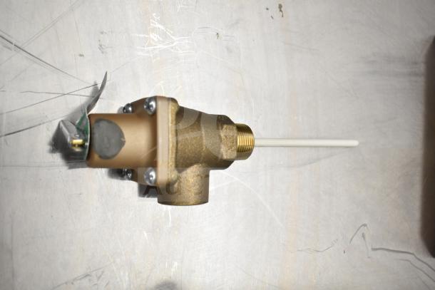 Watts temperature and pressure safety relief valve, brass finish, new condition, visible pressure control lever.