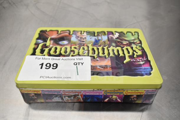 Goosebumps tin with 5 books, includes titles like "Night of the Living Dummy." Features colorful graphics, lid shows minor wear.