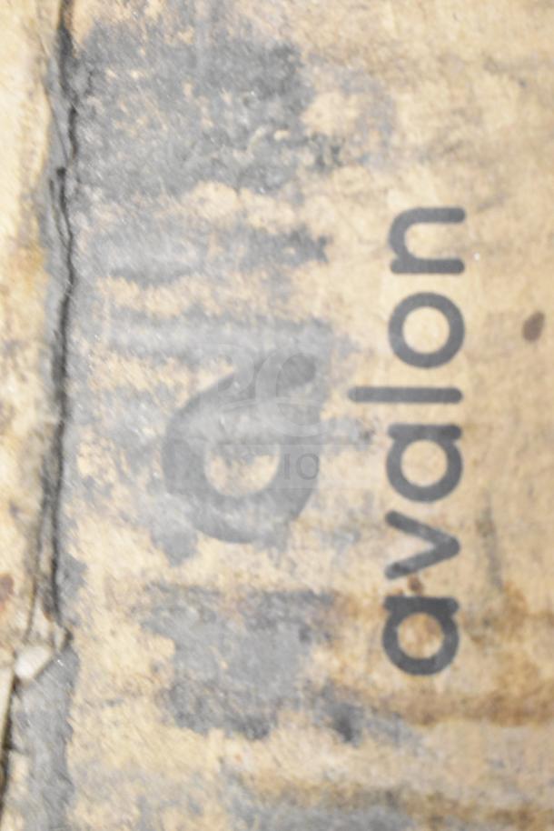 Avalon cardboard box labeled with logo, containing a self-adjusting cup dispenser and filter cartridges. New with scratch and dent.