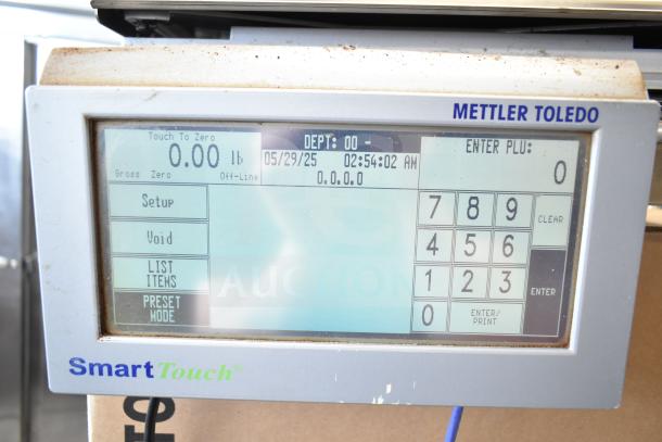 Mettler Toledo countertop food portioning scale with SmartTouch display, tested and working, showing menu and date.