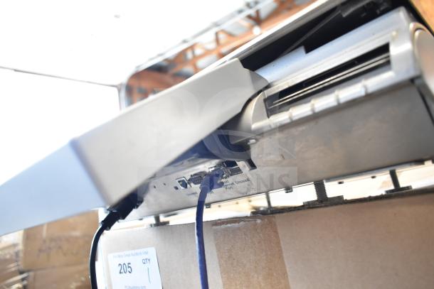 Mettler Toledo countertop food portioning scale with visible connection ports, tested and working condition.