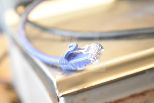 Mettler Toledo Countertop Food Portioning Scale with network cable shown; tested and in working condition.