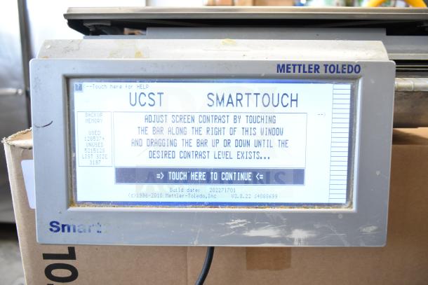 Mettler Toledo countertop food portioning scale, touchscreen interface, no power cord, tested and working, some wear visible.