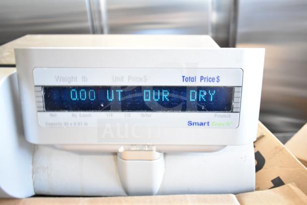 Mettler Toledo countertop food portioning scale, tested and working, no power cord included. Display shows "Smart Touch."