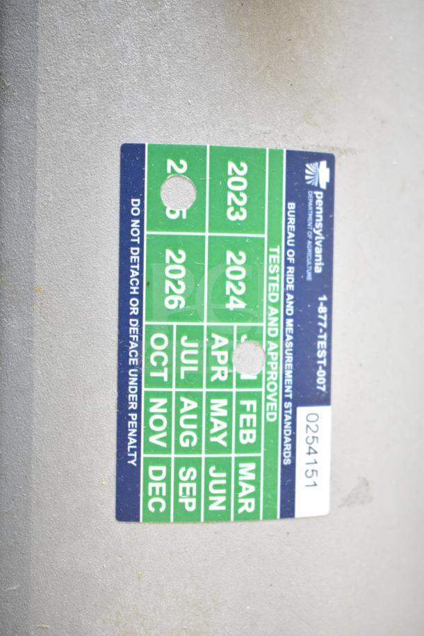 Mettler Toledo Countertop Food Portioning Scale, tested and working, label shows inspection years 2023-2026. No power cord included.