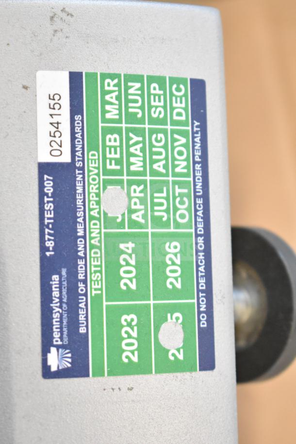 Mettler Toledo countertop food portioning scale, tested and working, lacks power cord. Label shows testing approval for 2023.