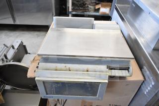 Mettler Toledo countertop food portioning scale, no power cord, tested non-functional, visible wear and markings.