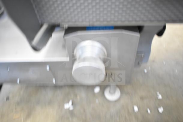 Jaccard VA2000GRT commercial countertop automatic meat slicer. Features a control knob. 110 volts, 1 phase.