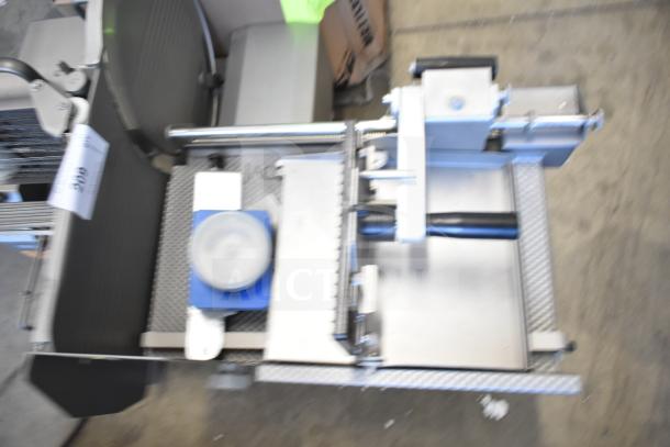 Jaccard VA2000GRT commercial countertop meat slicer, automatic, 110 volts, 1 phase, gray metal finish, visibly good condition.