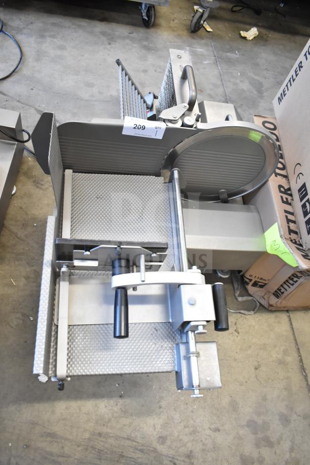 Jaccard VA2000GRT commercial automatic meat slicer on countertop. 110 volts, 1 phase. Appears in good condition.