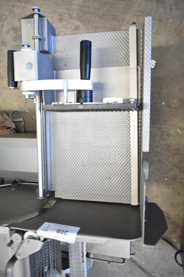 Jaccard VA2000GRT commercial automatic meat slicer, countertop model, 110V, 1 phase, sturdy stainless steel construction.