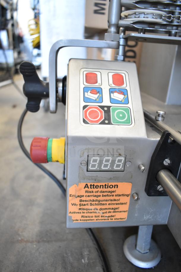 Jaccard VA2000GRT meat slicer, countertop model, 110V, 1 phase. Control buttons, digital display, caution label visible.