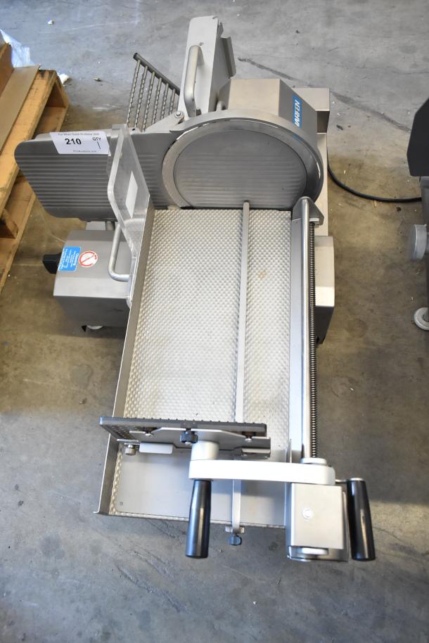 Scharfen VA2000 GR commercial countertop automatic meat slicer, 110 volts, 1 phase. Durable metal build, used condition.