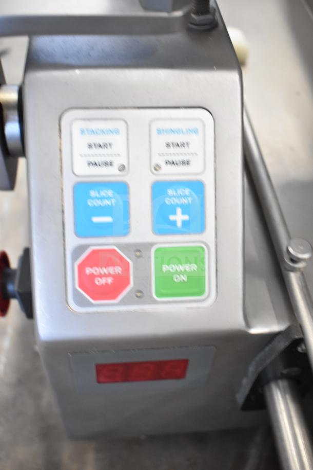 Scharfen VA2000 GR commercial meat slicer control panel, featuring stacking, shingling, power, and slice count buttons.