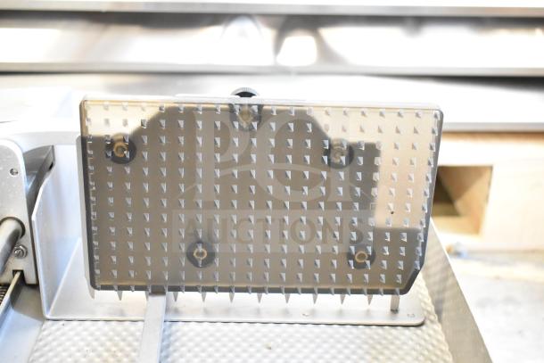 Scharfen VA2000 GR meat slicer stacker, featuring textured sliding plate, in good condition, 110V, 1 phase.