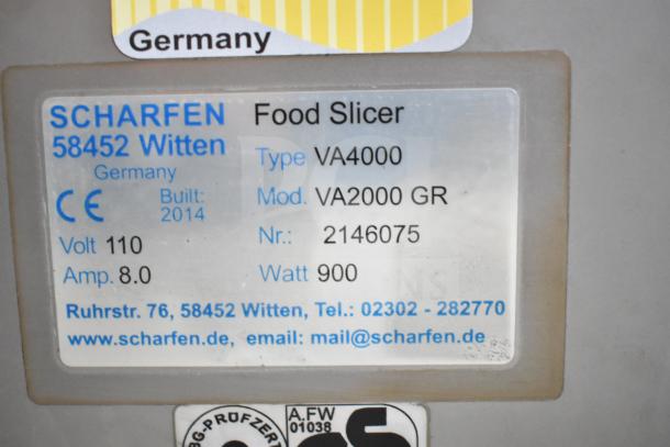 Scharfen VA2000 GR commercial meat slicer label, 110V, model VA4000, 2014, 900W, manufactured in Germany.