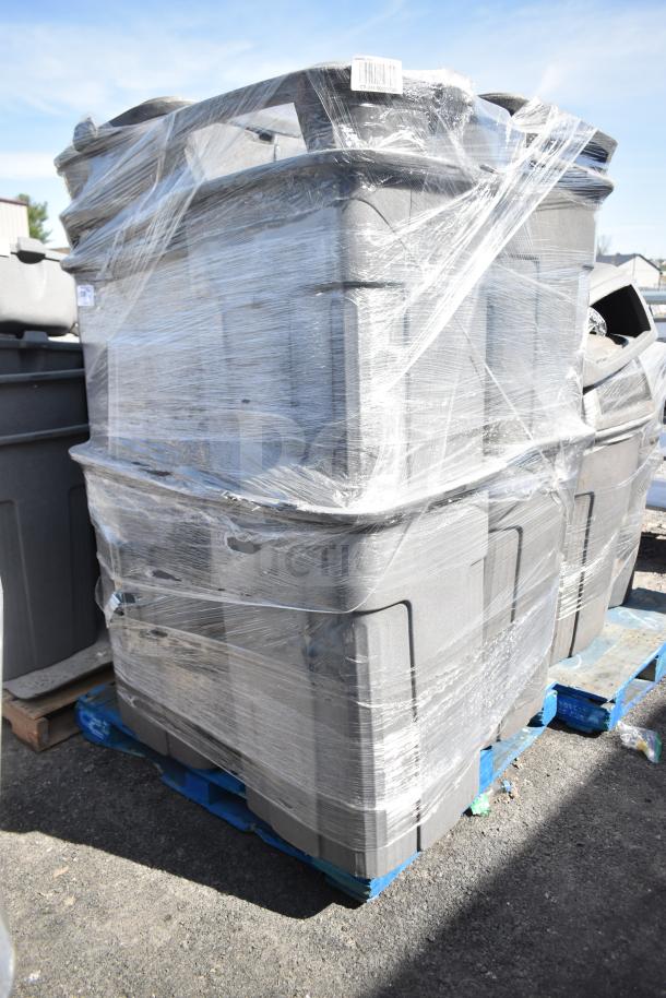 Stack of 8 gray poly trash cans wrapped in plastic on a pallet; bulk auction item.