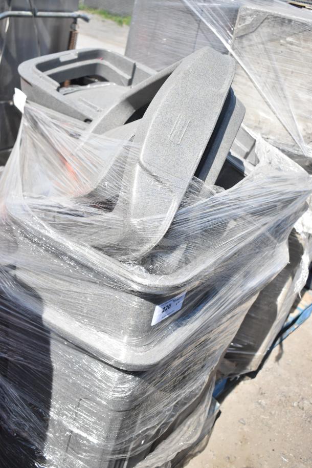 Six gray poly trash cans stacked and shrink-wrapped, in good condition. Auction tag number 226 visible.
