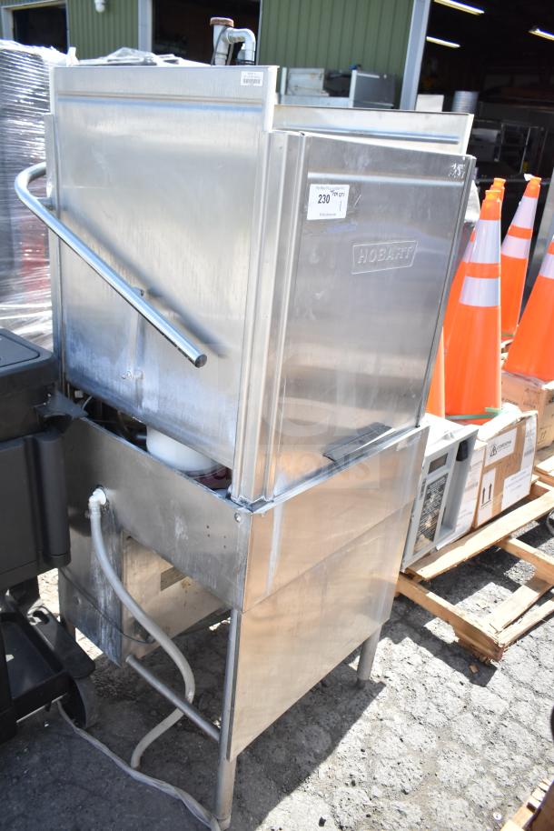 Hobart AM-14 Commercial Straight Pass Through Dishwasher in stainless steel. Visible wear, model label intact.