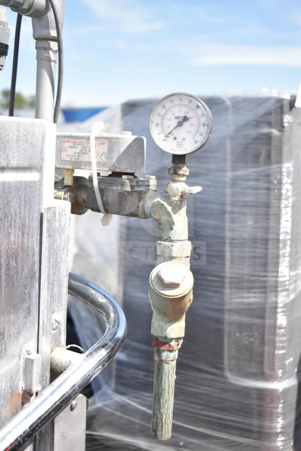 Hobart AM-14 pass-through dishwasher with gauge and valves. Model AM-14. Used condition, industrial setting.