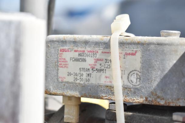 Hobart AM-14 Commercial Dishwasher label showing specifications: Cat. No. HU2360183, Serial FCH88586, steam 5-50 PSI.