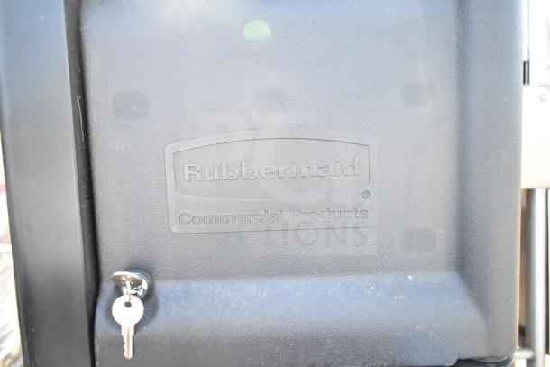 Rubbermaid black poly janitor cart on casters, features a Rubbermaid Commercial Products logo and includes a key lock mechanism.