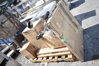 New scratch and dent items including a 17-gal industrial tote, Excalibur 36" square tabletop, and pan rack stacked on pallet.