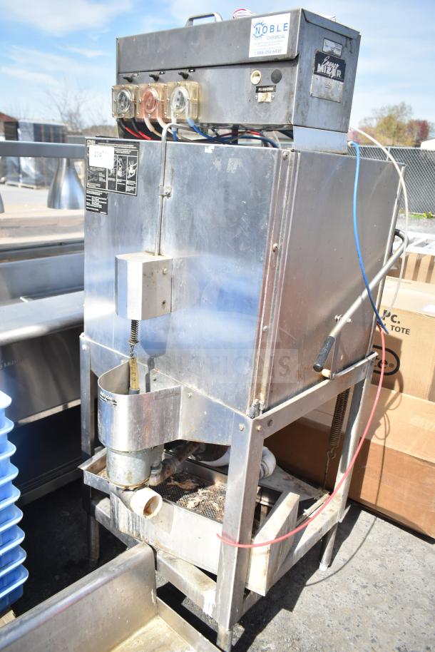 CMA AH-2 commercial pass-through dishwasher, stainless steel, used condition, visible labels and connections.