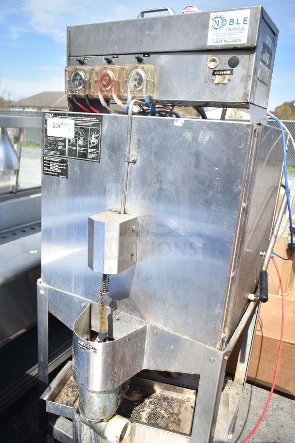 CMA AH-2 commercial pass-through dishwasher, stainless steel, visible wear. Labels and controls indicate settings and operation.