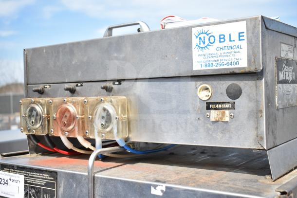 CMA AH-2 Commercial Pass Through Dishwasher with Noble Chemical label. Visible controls and fill/start switch; used condition.