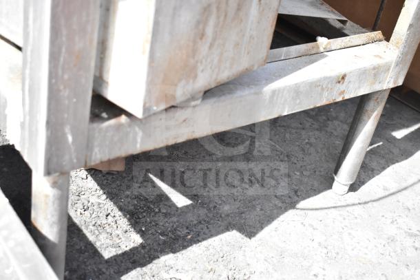 CMA AH-2 commercial dishwasher, stainless steel, visible rust and wear, straight pass-through design.