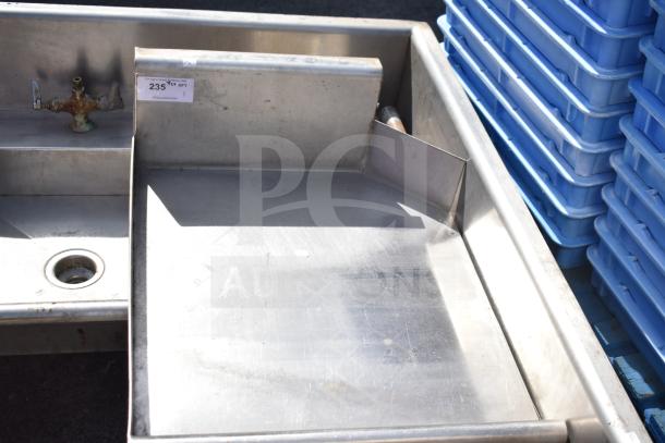 Stainless steel left side clean side dishwasher table, no legs, with faucet and drain. Auction tag shows item 235.