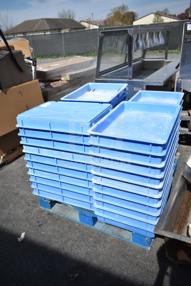 Stack of 39 blue poly dough bins on a pallet. Used condition, ideal for bulk storage. Auction includes all bins.