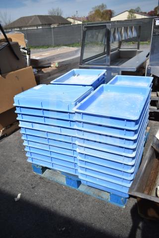 Stack of 39 blue poly dough bins on a pallet. Used condition, ideal for bulk storage. Auction includes all bins.