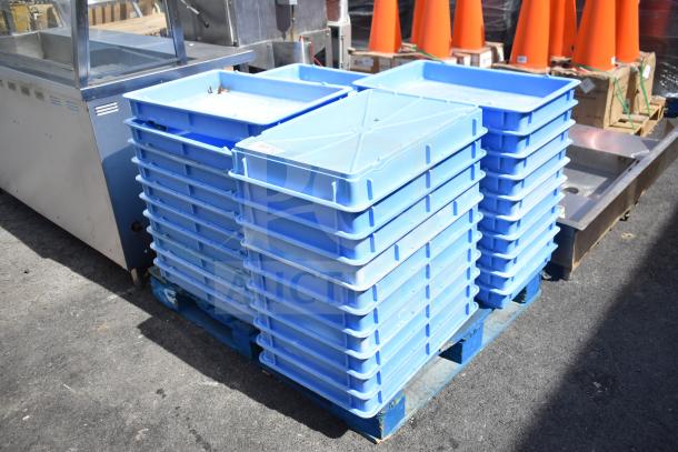 39 blue poly dough bins stacked on pallet, excellent condition, ideal for bakery use, amplifying bid value.