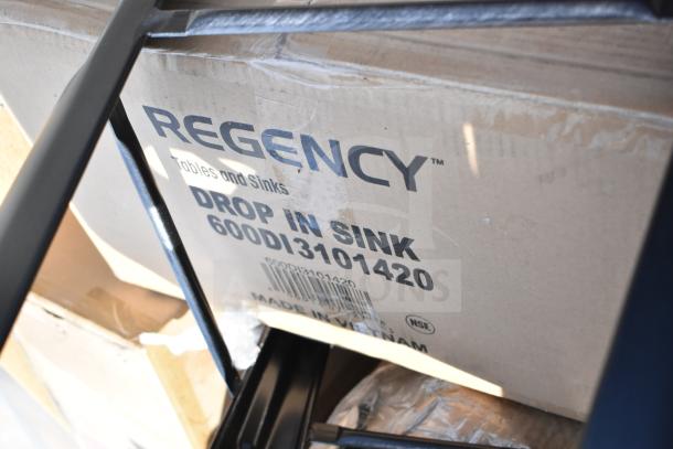 Regency drop-in sink box, model 600DI3101420, visible in packaging, showing "Made in Vietnam" label. Scratch and dent item.