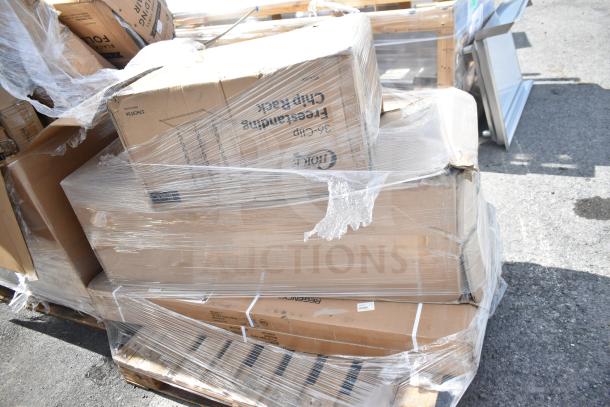 4 new scratch-and-dent items: boxed stool, shelf, others. Wrapped in plastic. Boxes marked "Freestranding Chip Rack."